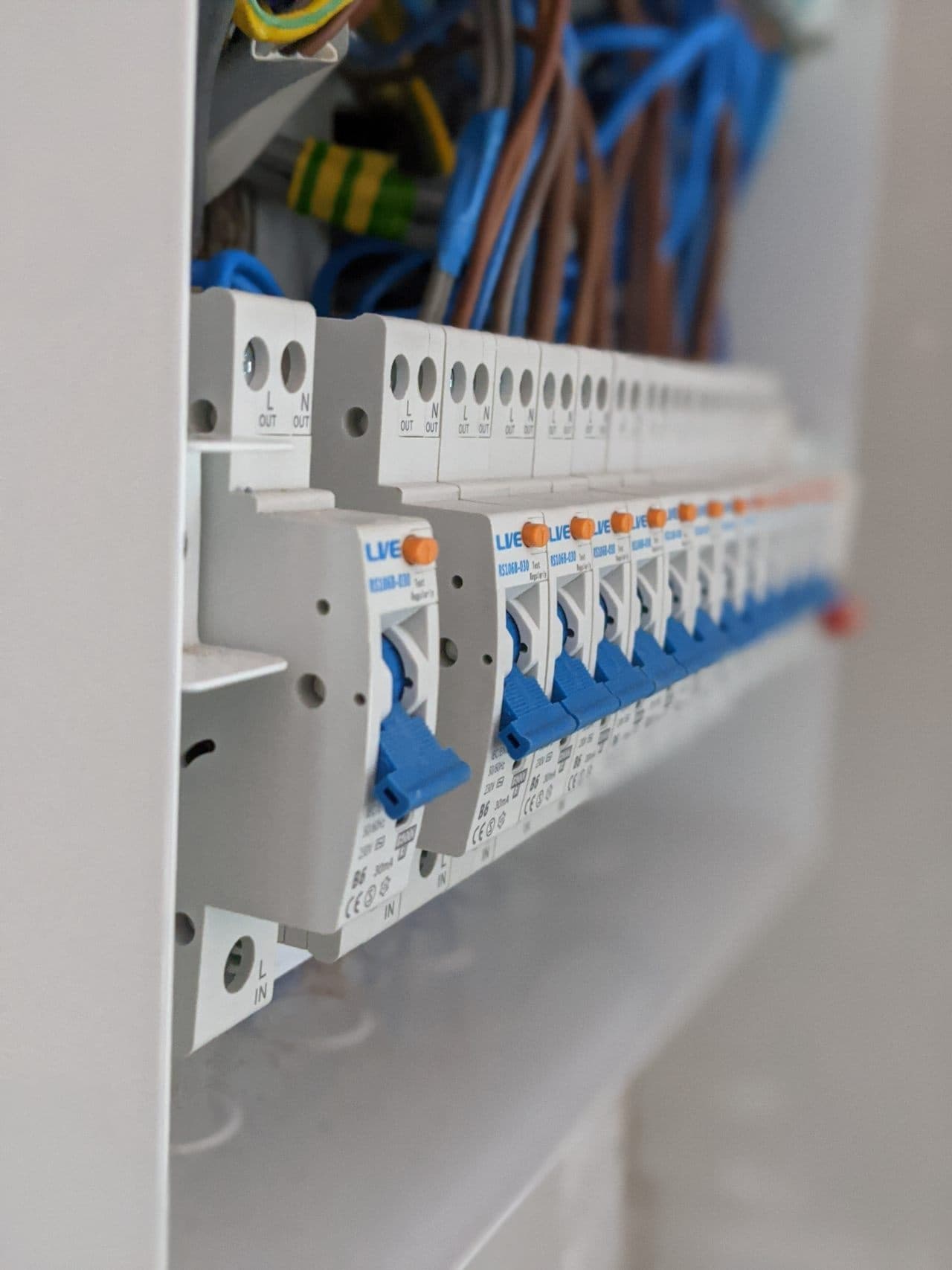 Electrician in Poole installing a new consumer unit