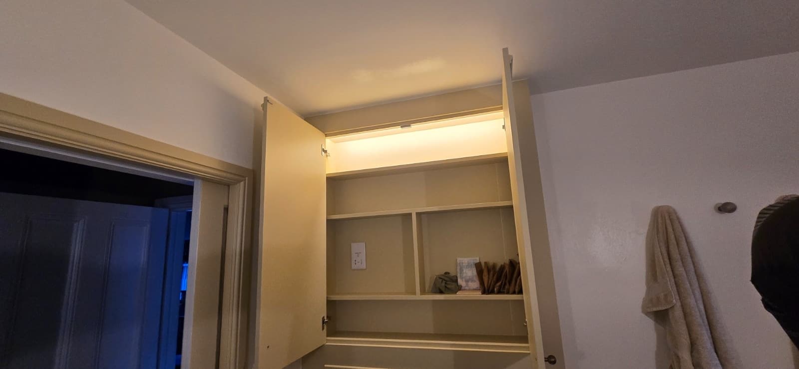 Door-activated LED strip — cupboard