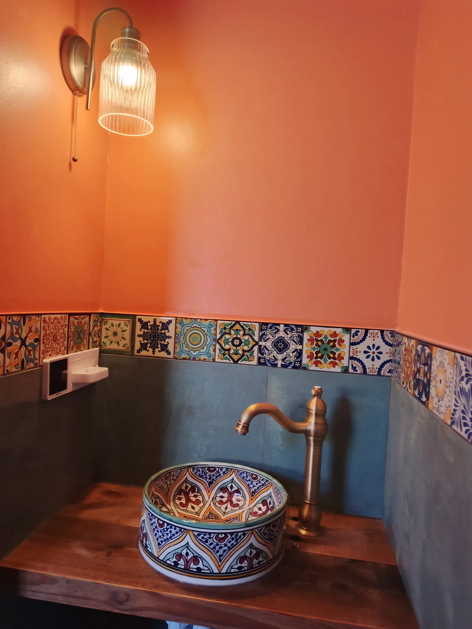 Pull-cord bathroom wall light above the basin, with underfloor heating controller and toothbrush charger, Bournemouth BH5