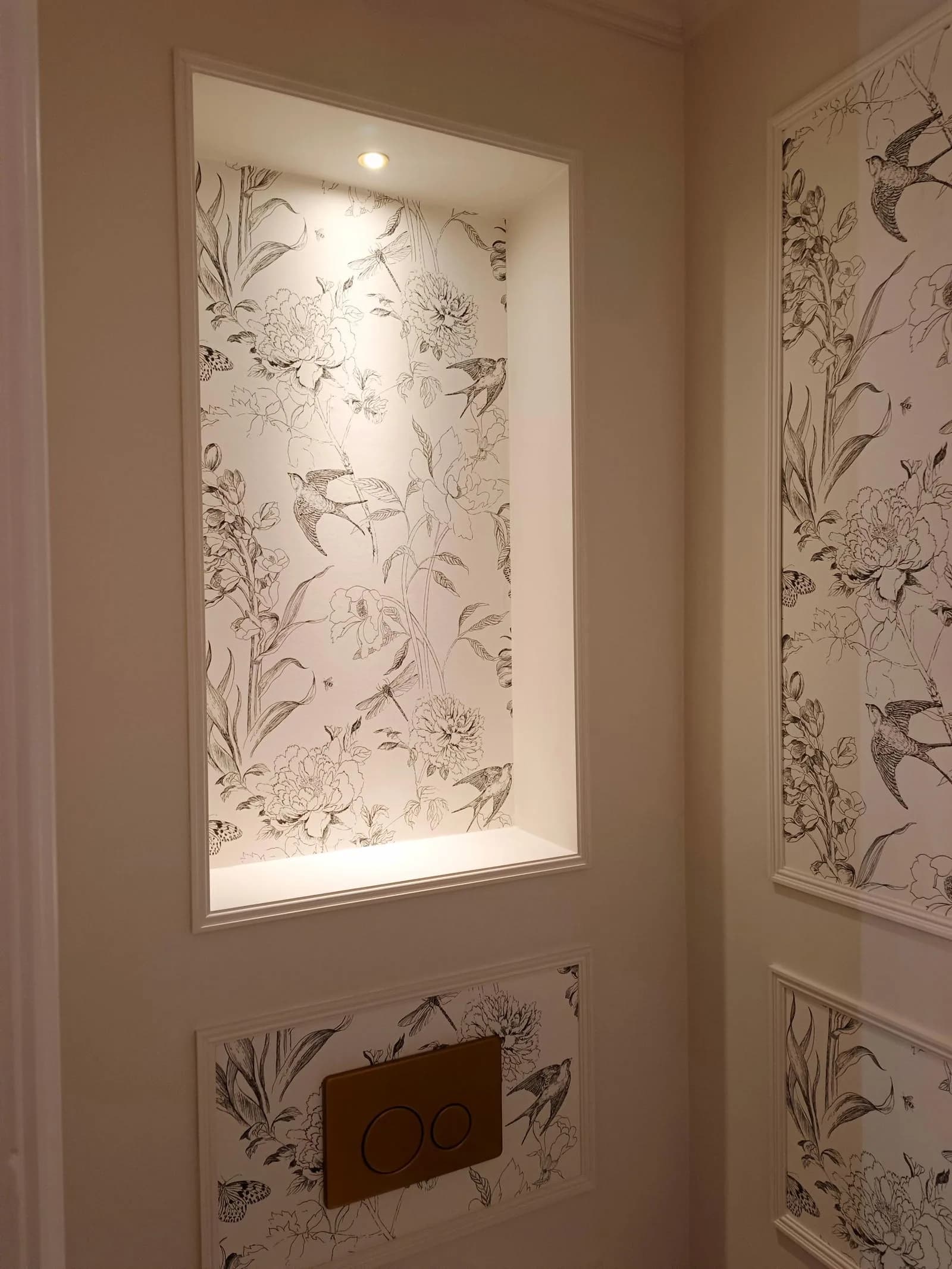 Motion-activated niche downlight above a concealed cistern in a Poole BH14 cloakroom