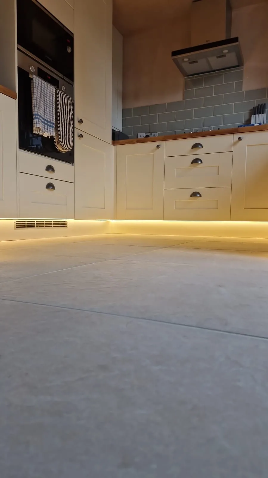 Continuous LED plinth light following the corner of a kitchen in Winton, Bournemouth BH9