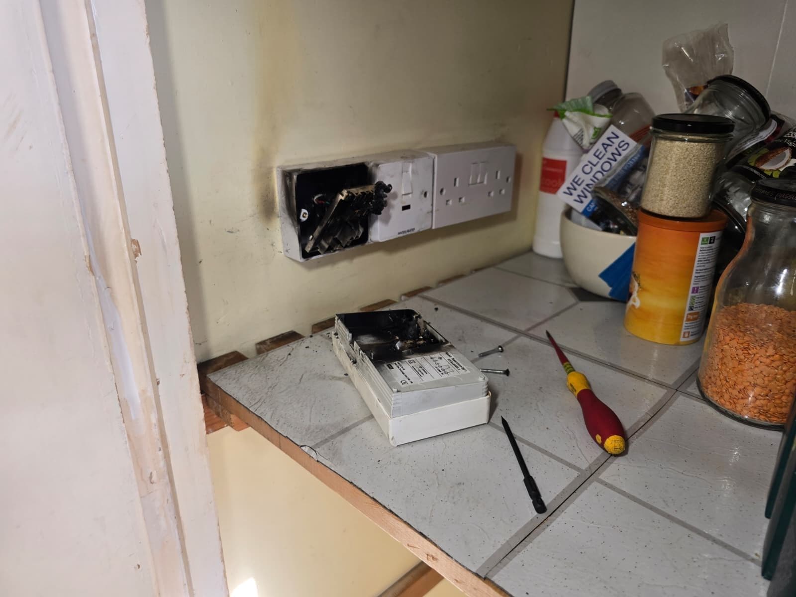 Electrician testing electrical installations on-site in Bournemouth.