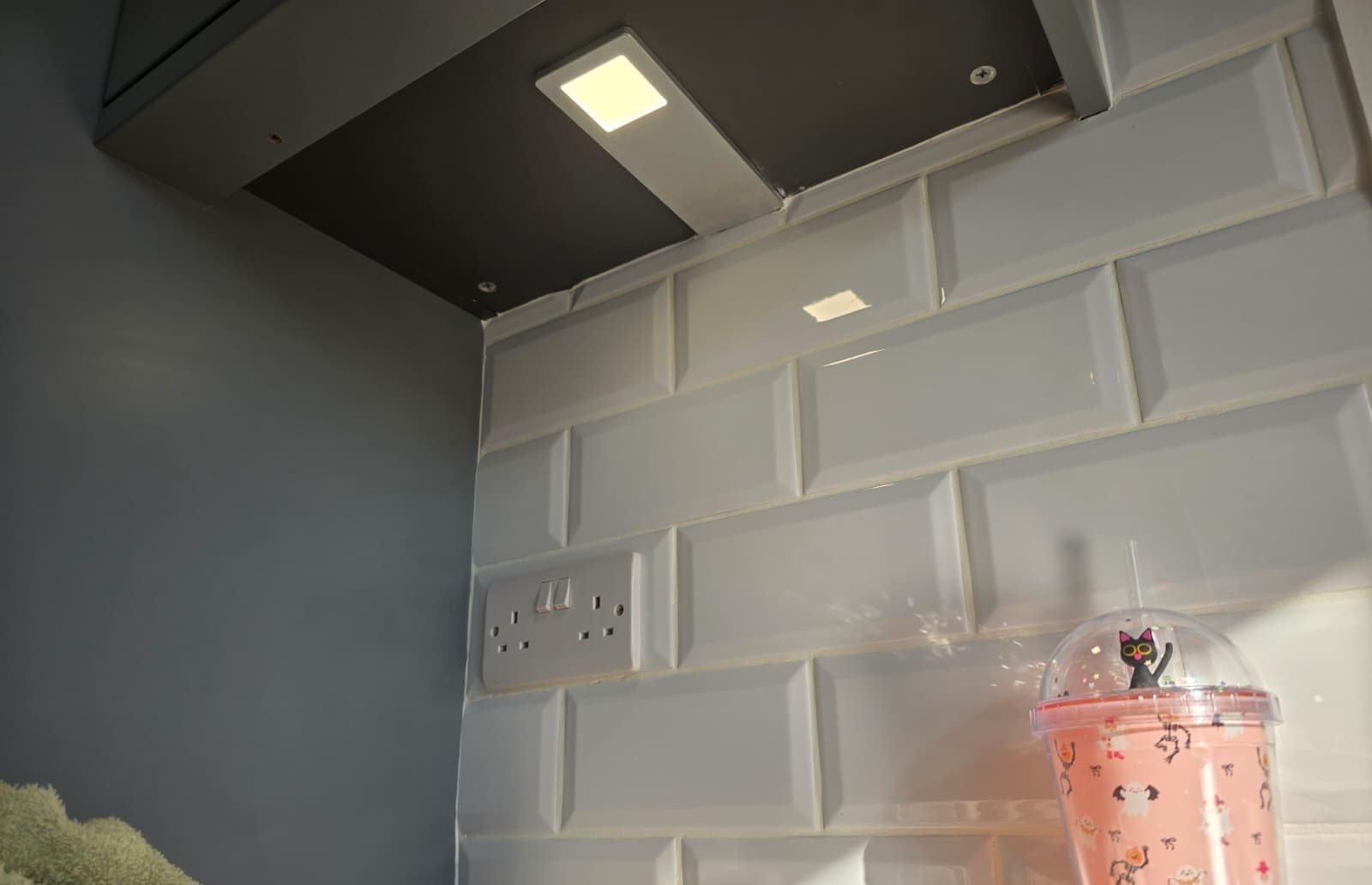 High-density LED profile lighting installed underneath kitchen cupboards to eliminate shadows.