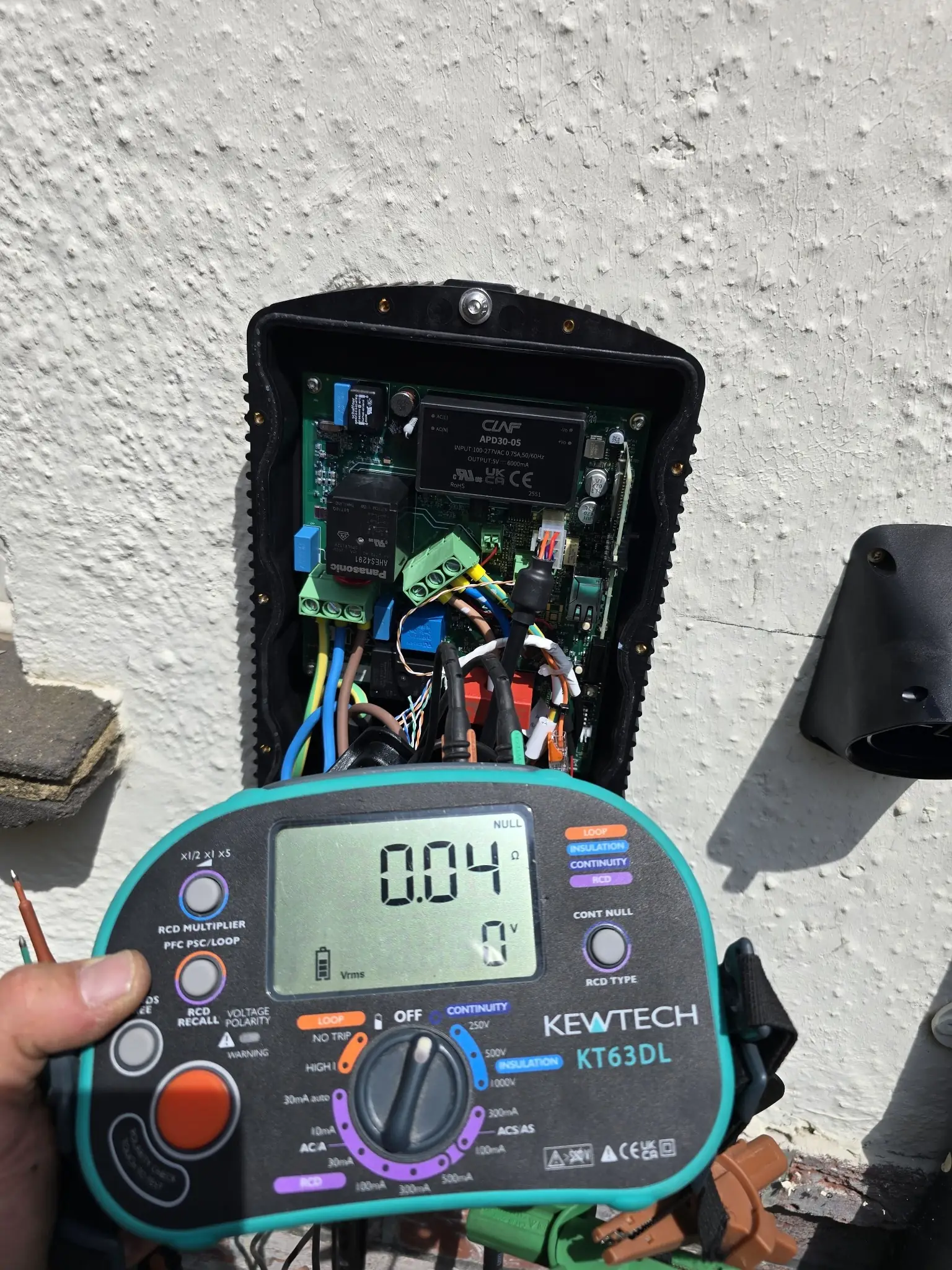 Electrician testing the Hypervolt EV charger using a Kewtech KT63DL.