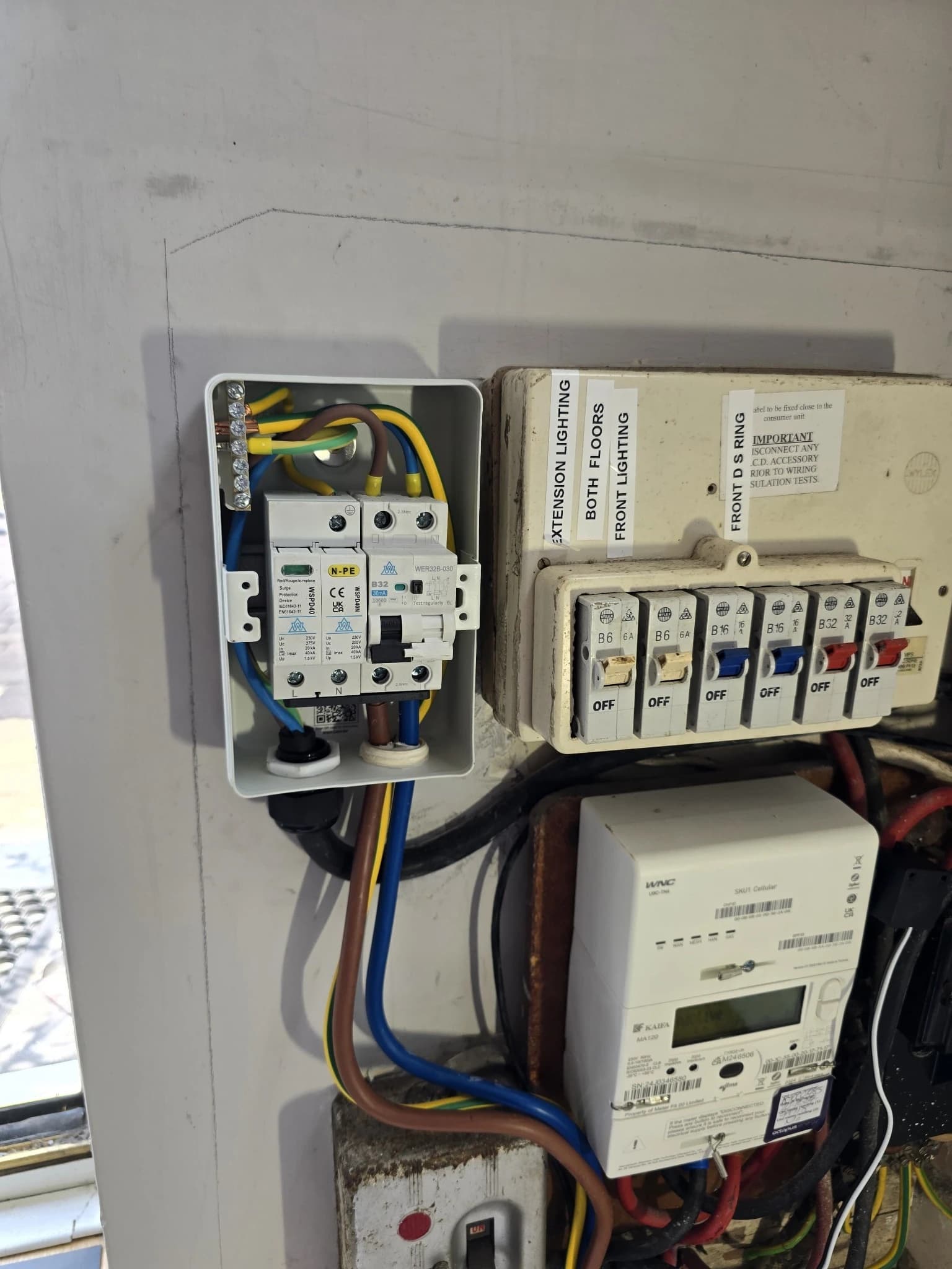 Consumer unit with dedicated EV charger RCBO and surge protection.